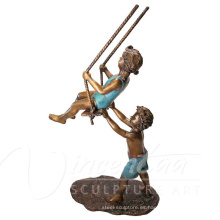 Arte de metal al aire libre artesanías de arte niños bronce juegan swing estatua del jardín